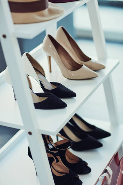 Styling with shoes Shot of high heels on display in a store pump dress shoe stock pictures, royalty-free photos & images