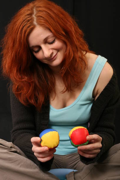 istock Young woman with red hair talking 956451068