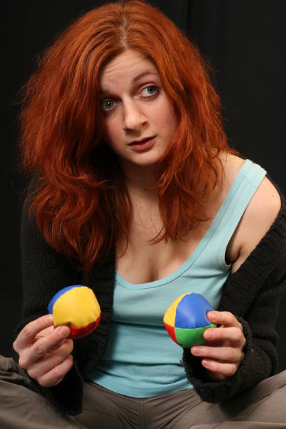 istock Young woman with red hair talking 956451084