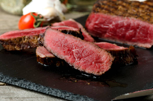 istock chopped beef roasted steak tomato close up 956453976
