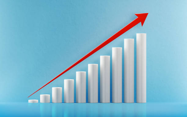 istock Financial Growth Bar With A Red Arrow Shape Moving Up Over Blue Background 956455128