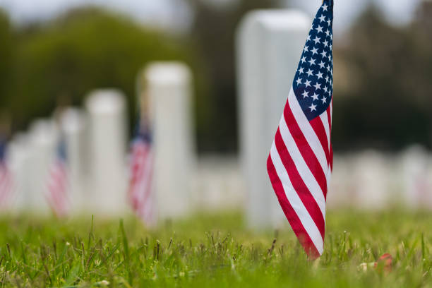 istock Small American flag at National cemetary - Memorial Day display 956460314