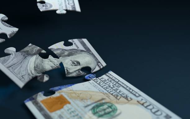 istock Jigsaw Puzzle Textured With One Hundred American Dollar Banknote On Blue Background 956468340