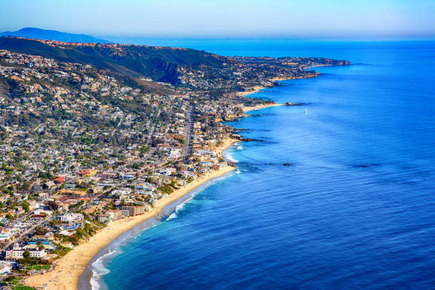 Southern California Coastal Aerial The beautiful community of Laguna Beach on the Pacific coast of southern Orange County, California shot from an altitude of about 1500 feet. laguna niguel photos stock pictures, royalty-free photos & images