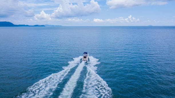 istock Aerial view, Yacht sailing in the ocean 956475410