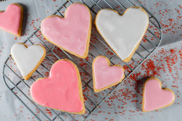 istock Frosted Heart Cookies on Cooling Rack 956478022