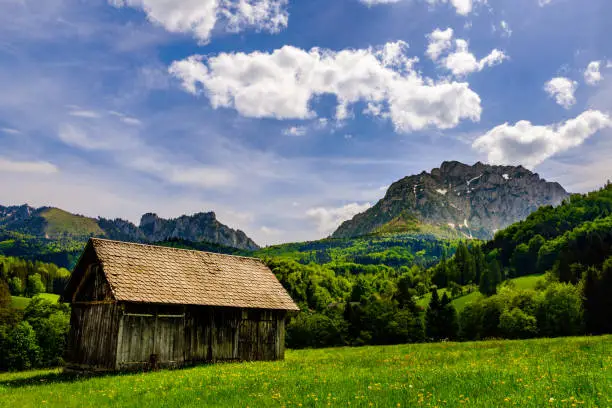 View on wooden cabin and mountains in Gmunden, Austria