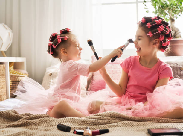 istock sisters are doing hair and having fun 956487180