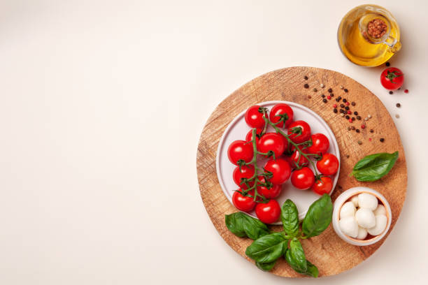 istock Tomatoes, basil, mozzarella cheese. Caprese salad ingredients 956495938