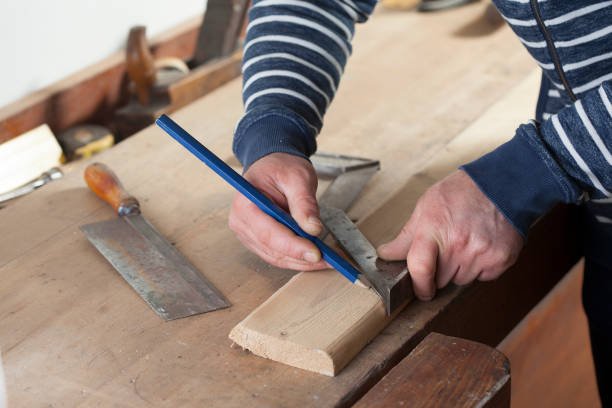 carpenter drawing on a wooden board.copy space