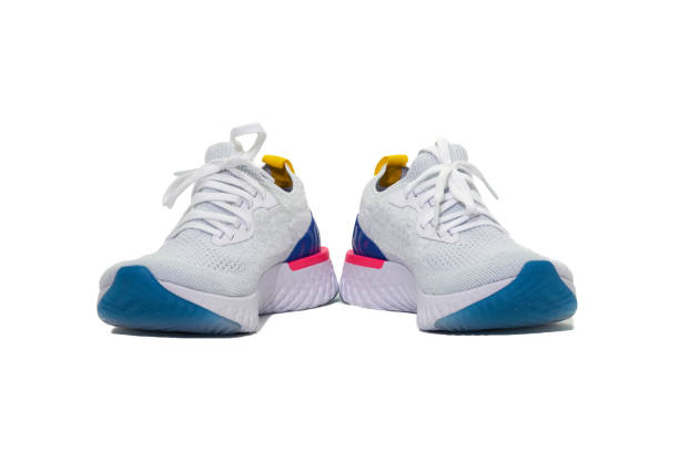 istock Sport shoes on isolated white background 956500894