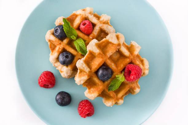 istock Traditional belgian waffles with blueberries and raspberries 956503888