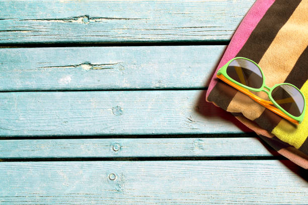 istock Beach accessories on wooden boards 956504170