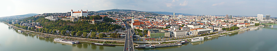 Panoramic view of Bratislava Slovakia with the Danube River in the foreground