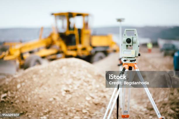 Surveyor Equipment Gps System Or Theodolite Outdoors At Highway Construction Site Surveyor Engineering With Total Station Stock Photo - Download Image Now