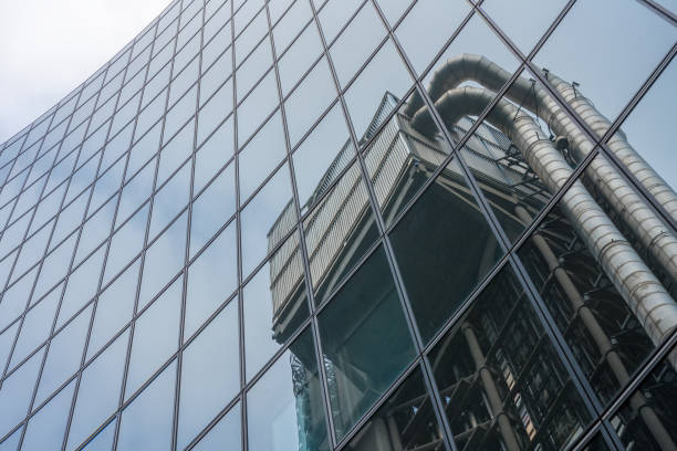 Reflection of  skyscraper in facade of other skyscraper stock photo