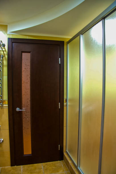 istock veneered wooden door in the hallway 956514940