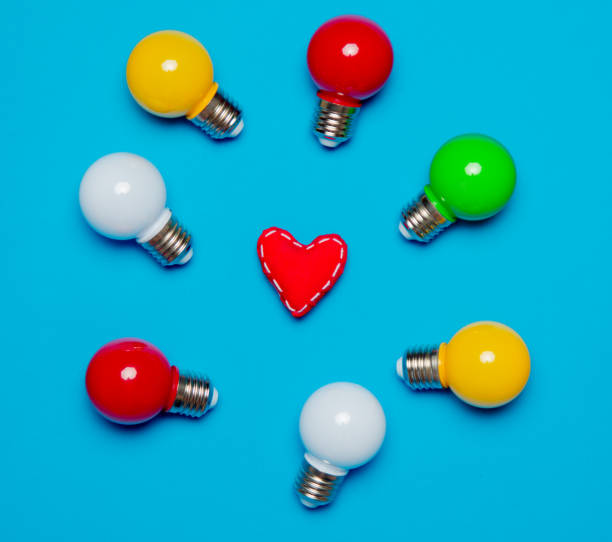 istock colored bulbs and heart shape toy 956530734