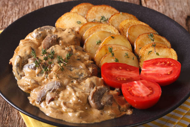 istock Diana steak with mushrooms and cream sauce close-up. horizontal 956539596
