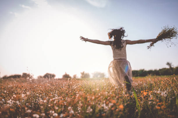 istock Dreaming awake in a flower field 956558324