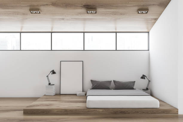 istock White wall bedroom interior with poster 956559060