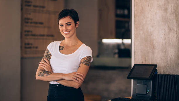 istock Attractive female cafe owner 956559604