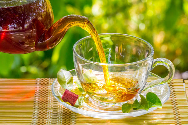 istock Black tea beautifully composed in the nature 956560462