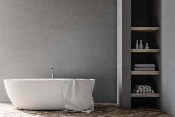 istock Gray bathroom interior, white tub 956563326