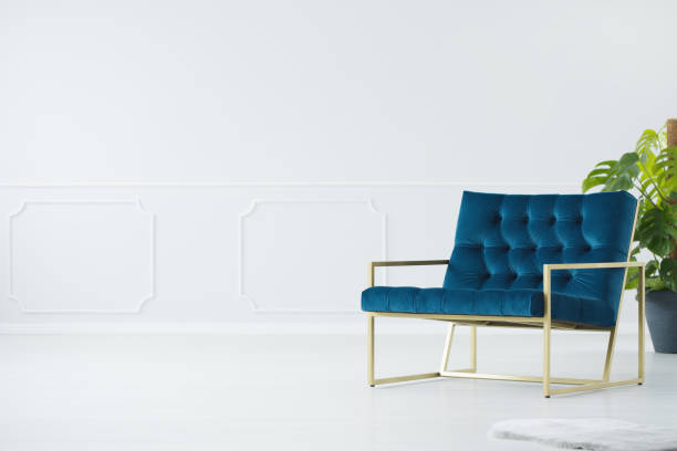 istock Blue chair with golden frame 956563428