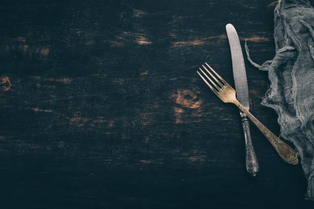 istock Old cutlery. Top view On a wooden background, Copy space. 956569312