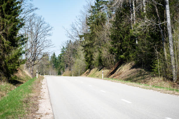 istock asphalt Road and the dramatic sky with strong perspective 956569674