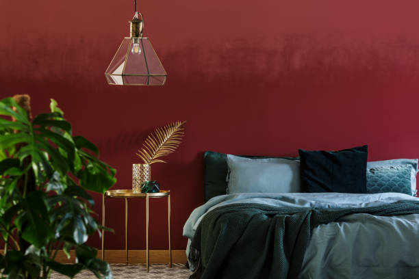 istock Red and green bedroom interior 956571370