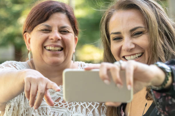 istock Friends posing together for a selfie 956579394