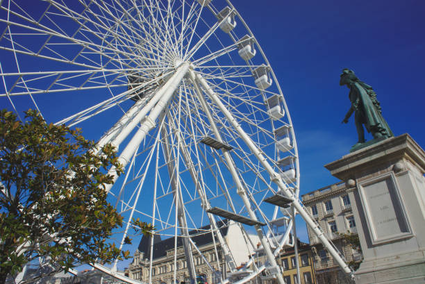 ferris wheel and statue place de jaude a clermont ferrand