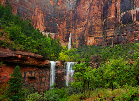 Three waterfalls are produced during a heavy rain at The Emerald Pools at zion National Park