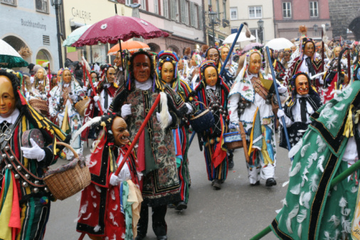 Oberkirch, Germany - February 12, 2023: Traditional carnival parade with traditionell masks and costumes