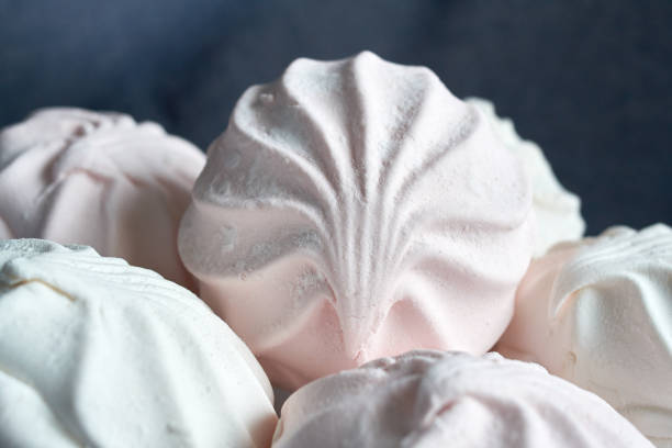 istock white and pink zephyr close-up on a white plate 956601422