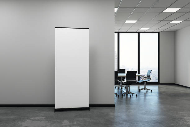 istock Modern meeting room with blank poster 956610398