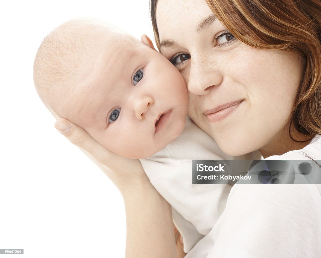Happy mother play with her child Happy mother play with her child, isolated over white 0-11 Months Stock Photo