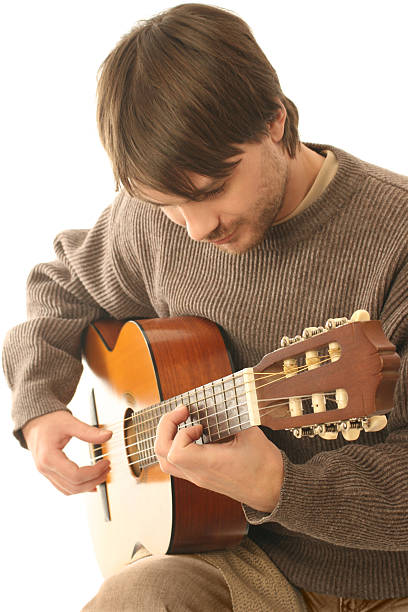 istock Guitarist acoustic guitar playing. 95661628