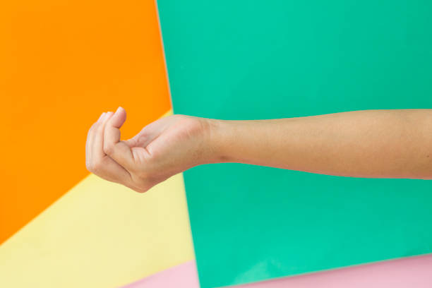 Hand holding something up