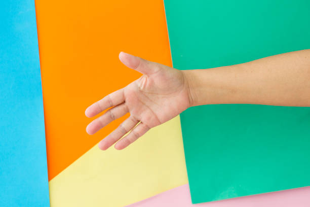 Business Handshake on multi colored background