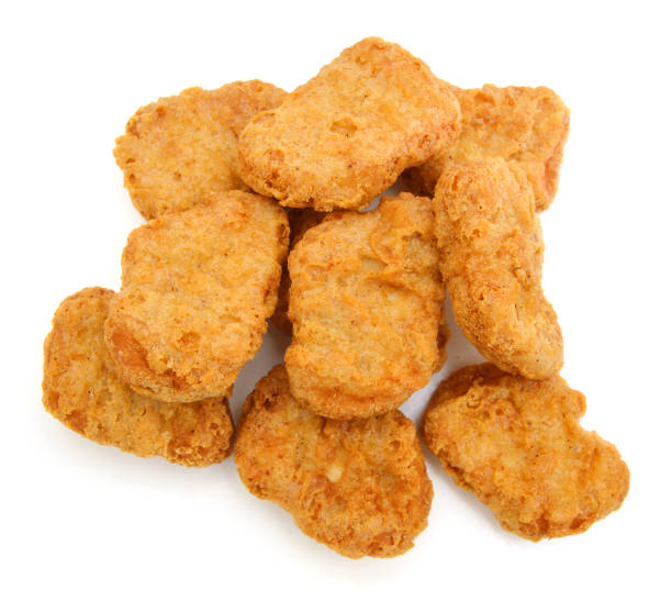istock Macro of fried chicken nuggets high resolution 956649316