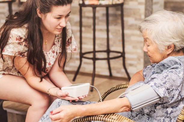 istock Grandma doing a check-up on the health at home. 956654012