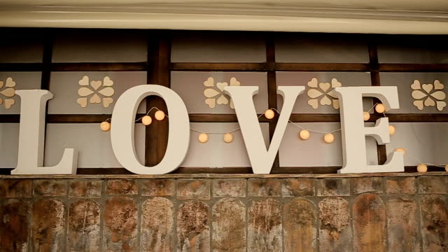Love text wedding decoration with to cute light bulbs