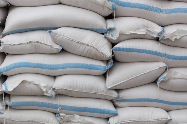 istock Bags with grains in stacks 956672378