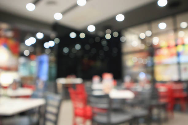 istock Restaurant cafe or coffee shop interior with people abstract defocused blur background 956676606