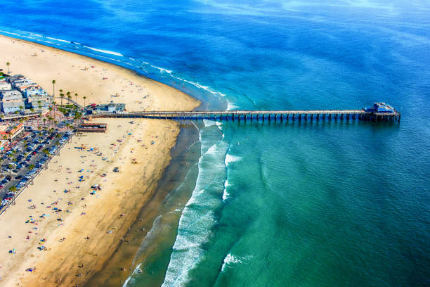 Newport Beach Pier Aerial The pier at Newport Beach in Orange County, California shot from an altitude of about 1500 feet. newport beach california stock pictures, royalty-free photos & images