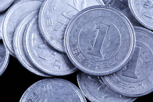 istock Japanese one yen coins on a black background 956692128