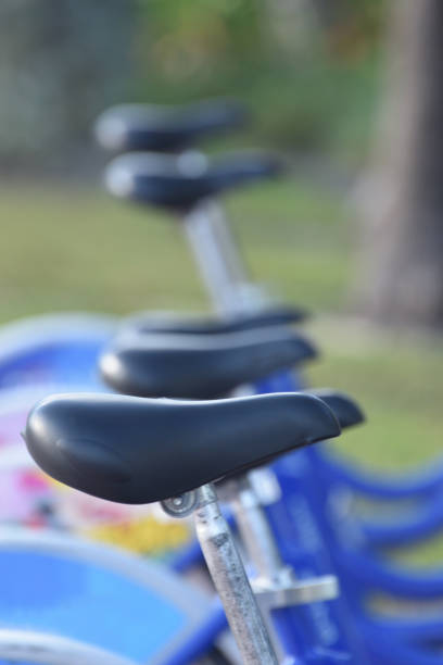 istock Blue Bicycles at Rental Depot Abstract 956694360
